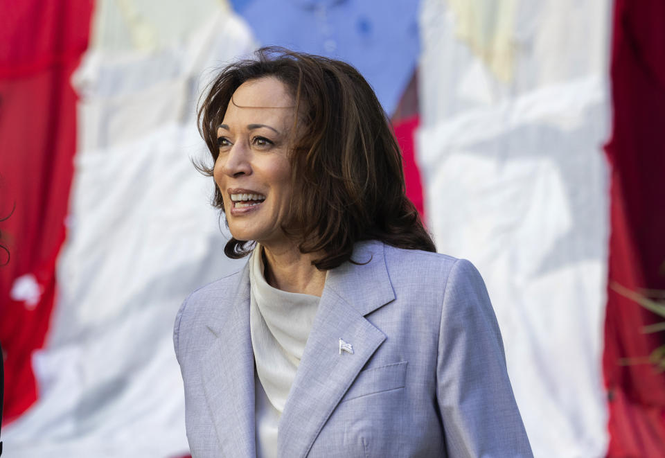 FILE - Vice President Kamala Harris stands in front of a Puerto Rican flag, in San Juan, Puerto Rico, March 22, 2024. Harris visited Puerto Rico to tout the administration's record on disaster relief and to attend a fundraiser. Puerto Rico will hold a Democratic presidential primary Sunday, April 28, the only opportunity for Democrats on the island to officially weigh in on the race for the White House. President Joe Biden has already unofficially clinched the nomination and faces minimal opposition on the ballot. (AP Photo/Alejandro Granadillo, File)