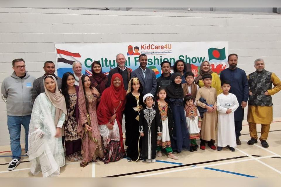 South Wales Argus: Some of the people involved in the show and it's success, including CEO Rusna Begum, councillors Farzina Hussain and Saeed Adan, John Griffiths MS, and some of the children and young people from the fashion show.