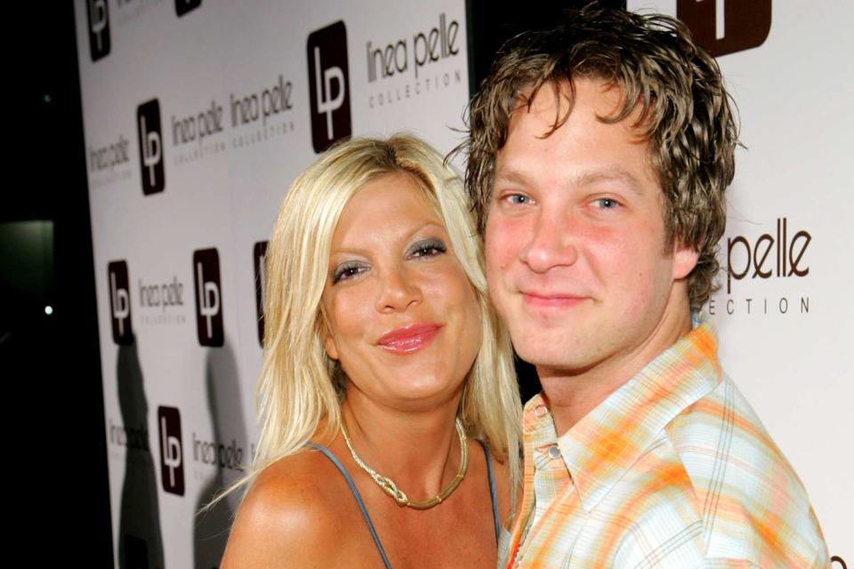 <p>John Shearer/WireImage</p> (L-R) Tori Spelling and Randy Spelling are pictured.