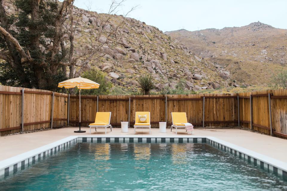 Anne lent her hand in designing the pool area too. The seating and side tables are by Room & Board. The tile around the edge of the waterline is from Fireclay Tile and those terrazzo pavers as the coping—that’s the name of the edge around a pool—is from Concrete Collaborative.