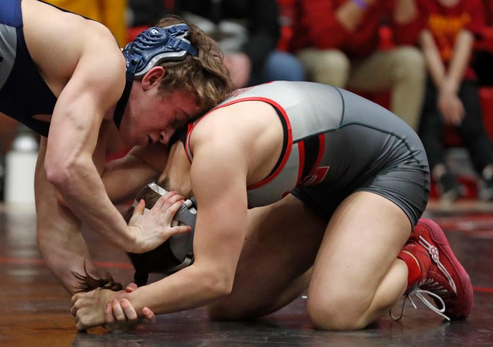 Central Catholic’s Alex Thomas and West Lafayette’s Rose Kaplan compete in the 120 lbs championship during the IHSAA wrestling sectional championship, Saturday, Jan. 28, 2023, at Lafayette Jeff High School in Lafayette, Ind.