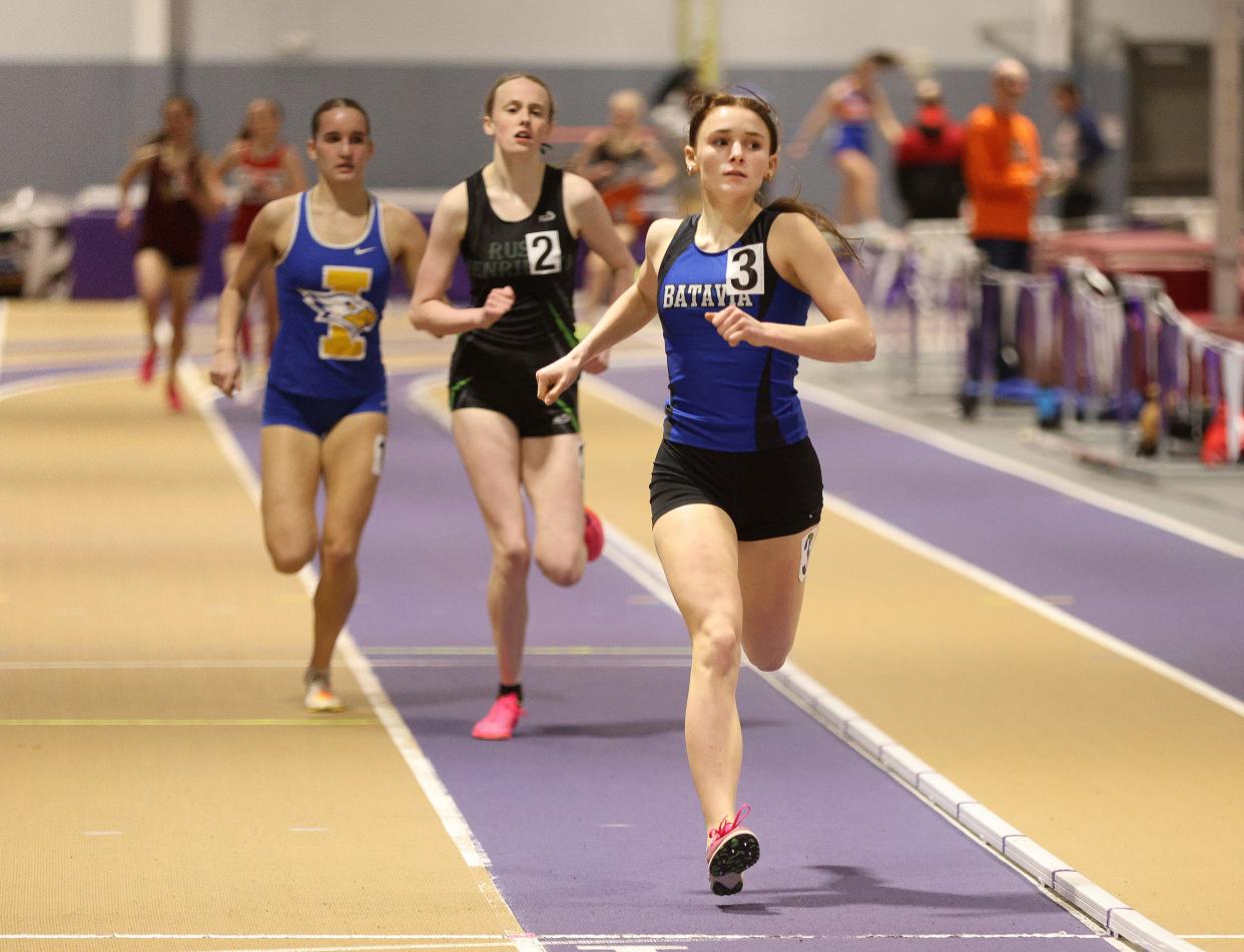 Batavia’s Campbell Riley finishes ahead of Rush-Henrietta’s Haylie Smith and Irondequoit’s Elizabeth Tytler in the girls 1000-meter race.