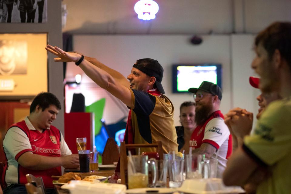 Tyler Jozwiak of Green Bay celebrates as Arsenal F.C. scores a goal against Orlando City, on Wednesday, July 20, 2022 at the Green Bay Distillery in Ashwaubenon, Wis. The Green Bay Armoury hosted a watch party for the game. Samantha Madar/USA TODAY NETWORK-Wisconsin