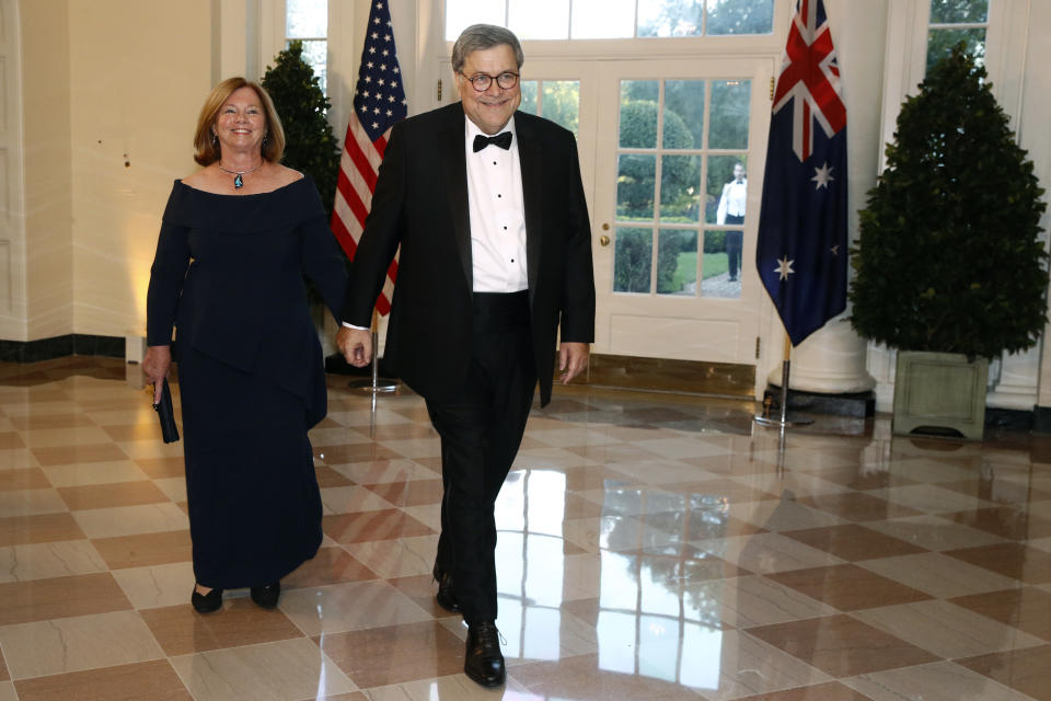 Attorney General William Barr, right, and wife Christine Barr arrive for a State Dinner with Australian Prime Minister Scott Morrison and President Donald Trump at the White House, Friday, Sept. 20, 2019, in Washington. (AP Photo/Patrick Semansky)