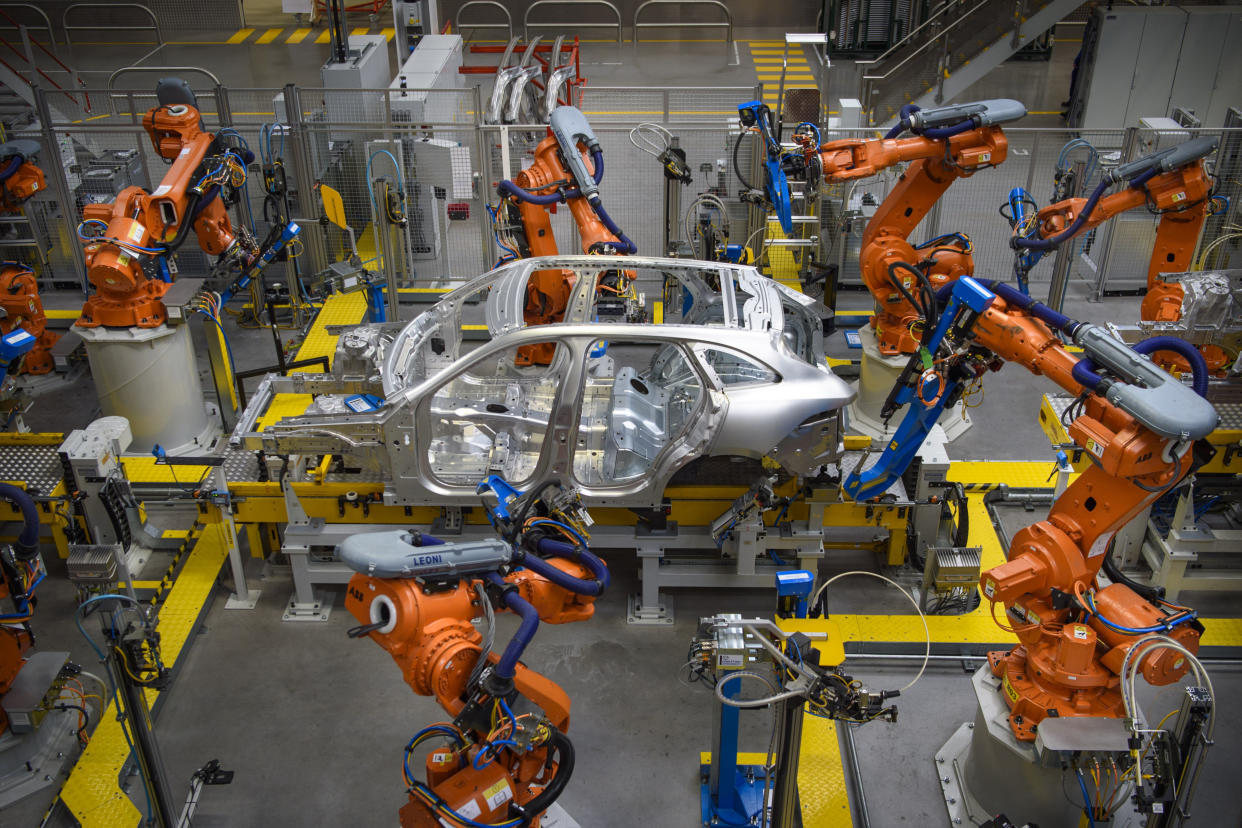 Cars being manufactured in the Aluminium Body Shop, part of Jaguar Land Rover's Advanced Manufacturing Facility in Solihull, Birmingham. Picture date: Wednesday March 15th, 2017. Photo credit should read: Matt Crossick/ EMPICS. Aluminium Body Shop 3 is Europe's largest aluminium body shop, and contains nearly 800 robots building Jaguar F-Pace and Range Rover Velar cars. It is capable of producing an aluminium car body every 76 seconds. 