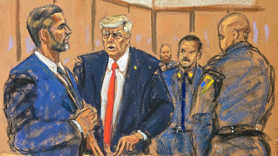 PHOTO: Former President Donald Trump chats with his son Eric Trump during his criminal trial in Manhattan state court in New York City, U.S. April 30, 2024, in this courtroom sketch. (Jane Rosenberg/Reuters)