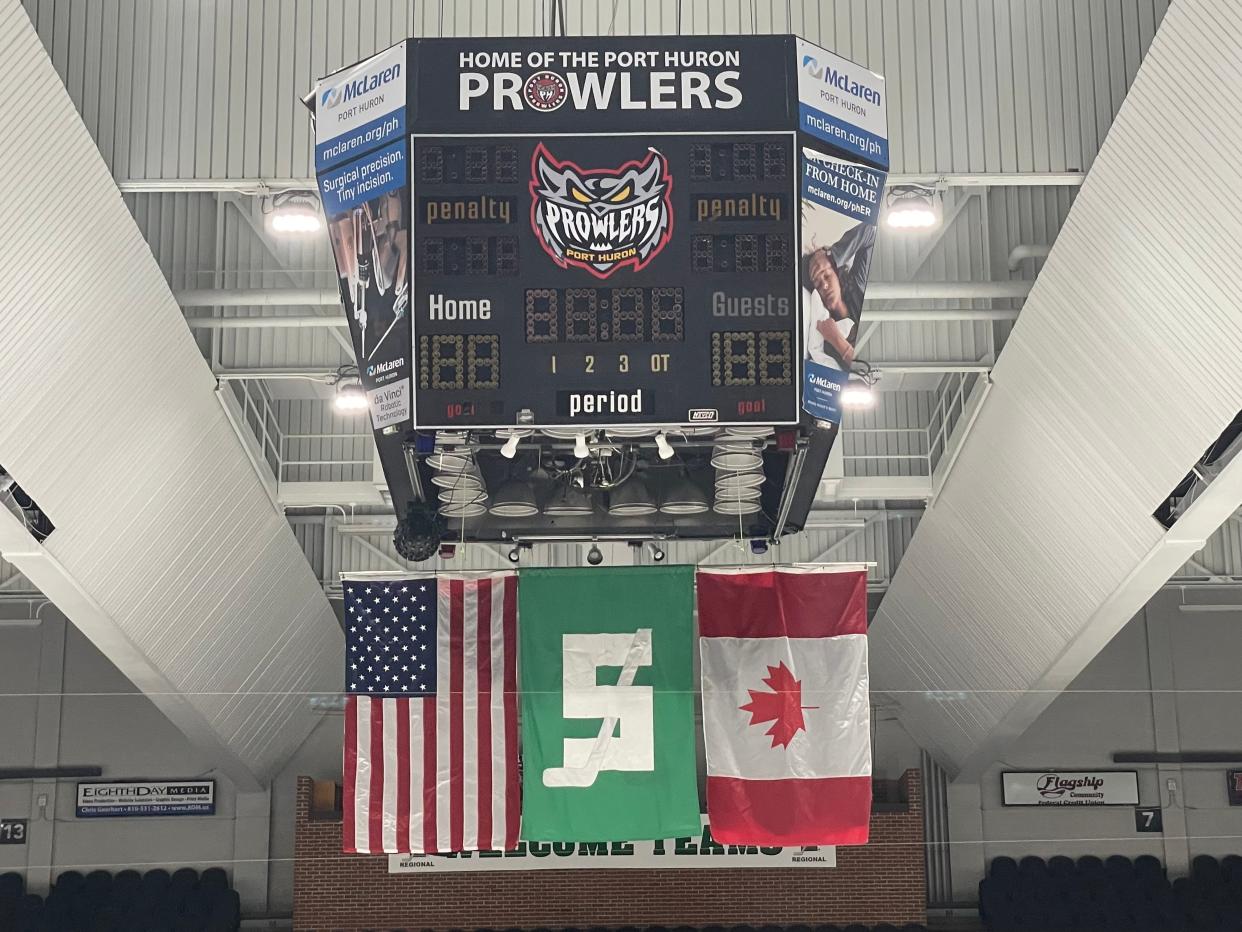 The United States, Canadian and Silver Stick Tournament flags hanging from the ceiling at McMorran Place Ice Arena on January 3, 2023. The 2023 Silver Stick Tournament will take place in Port Huron starting Jan. 5.