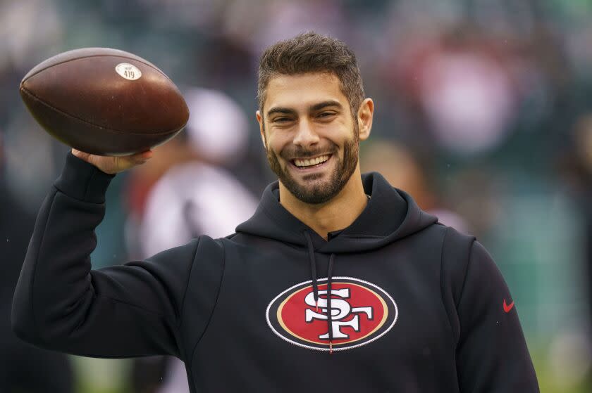 San Francisco 49ers quarterback Jimmy Garoppolo (10) looks on prior to the NFC Championship NFL football game against the Philadelphia Eagles, Sunday, Jan. 29, 2023, in Philadelphia. (AP Photo/Chris Szagola)