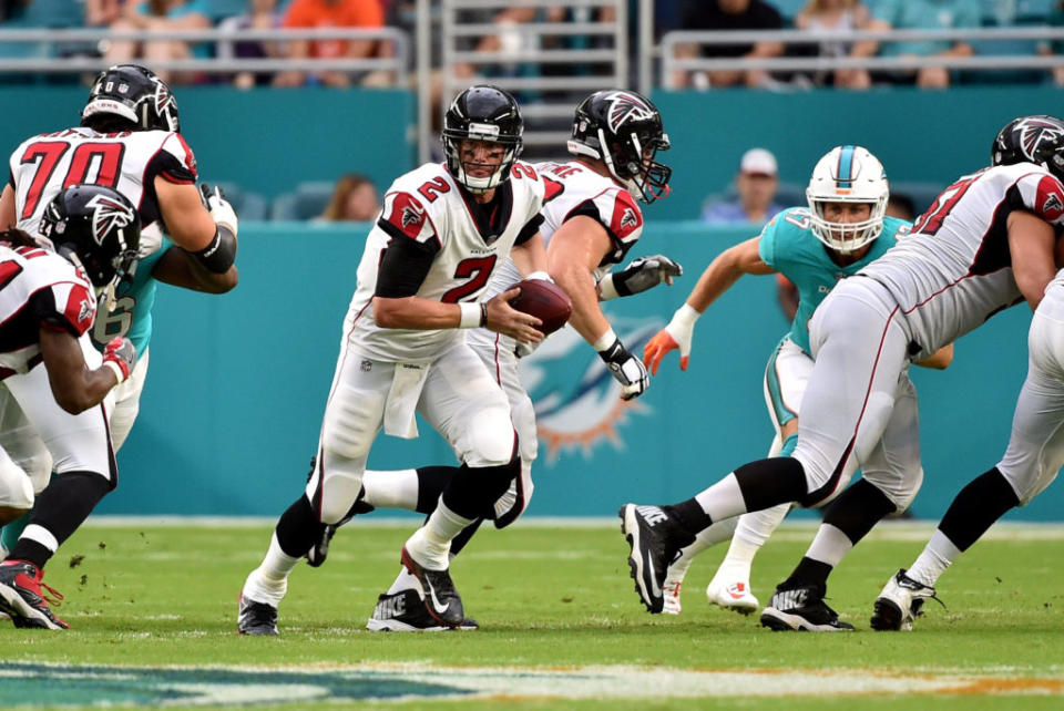 Aug 10, 2017; Miami Gardens, FL, USA; Atlanta Falcons quarterback Matt Ryan (2) hands the ball off during the first half against the Miami Dolphins at Hard Rock Stadium. Mandatory Credit: Steve Mitchell-USA TODAY Sports