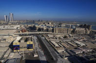 A view of the Place Vendome mall, right, and Lusail plaza towers, left, in Lusail downtown, Qatar, Thursday, Nov. 24, 2022. (AP Photo/Pavel Golovkin)