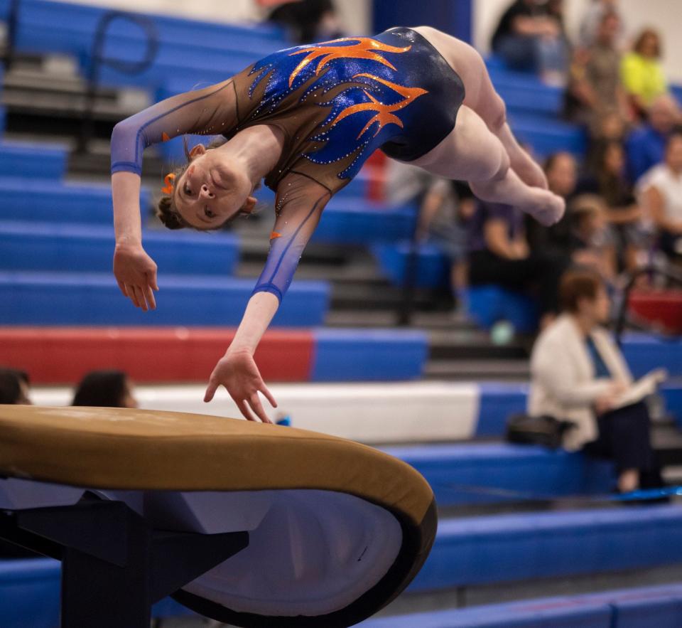 San Angelo Central High School&#39;s Haley Ditmore competes on vault during the District 2-6A Gymnastics Championships at Cougar Gym in Abilene on Friday, March 25, 2022.