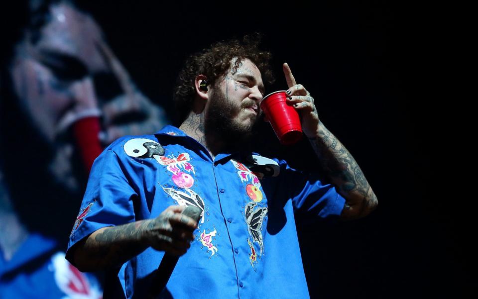 The US singer Post Malone on stage in 2019 - Getty Europe