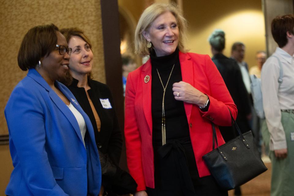 Kansas Department of Transportation Secretary Julie Lorenz, right, is leaving Gov. Laura Kelly's administration after Kelly's reelection in November.