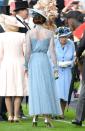 <p>The back of the Duchess's embellished dress included sheer details. Fans couldn't help but notice the pale blue color also matched the Queen. </p><p><strong>RELATED: <a href="https://www.goodhousekeeping.com/beauty/fashion/g3612/kate-middleton-best-casual-outfits/" rel="nofollow noopener" target="_blank" data-ylk="slk:60+ Times Kate Middleton Nailed the Casual Look;elm:context_link;itc:0;sec:content-canvas" class="link ">60+ Times Kate Middleton Nailed the Casual Look</a></strong></p>