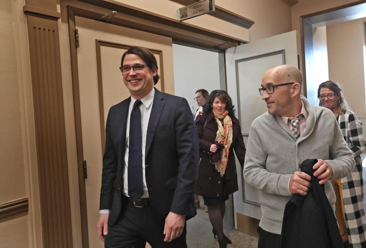 Attorney Wesley Hottot, left, with the Institute for Justice, and Tyson Timbs, right, leave the Grant County Superior Court I chambers in 2020 after an evidentiary hearing on whether Timbs would get back his Range Rover, which the state seized in a 2013 drug case. The vehicle was later returned after the Indiana and U.S. supreme courts ruled the state's action violated constitutional protections against excessive fines.