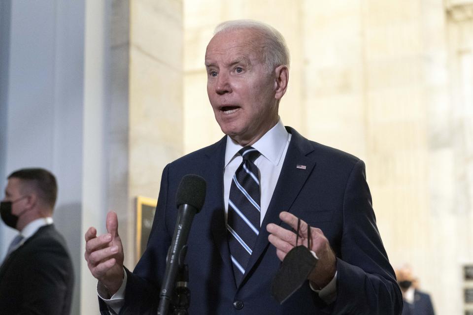 President Joe Biden speaks to the media after meeting privately with Senate Democrats, Thursday, Jan. 13, 2022, on Capitol Hill in Washington. (AP Photo/Jose Luis Magana)