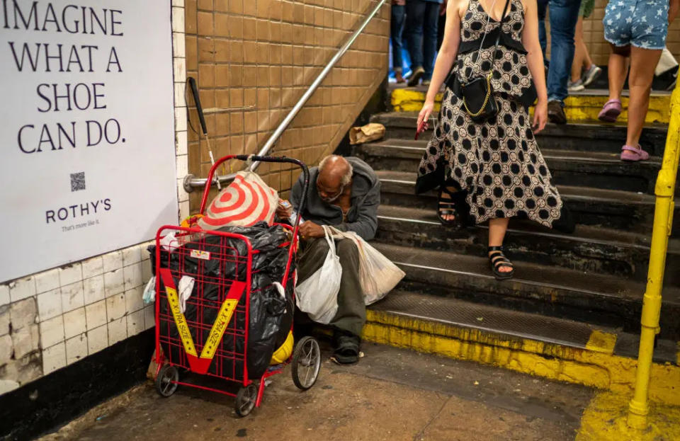 NYC homeless blocks subway entrance