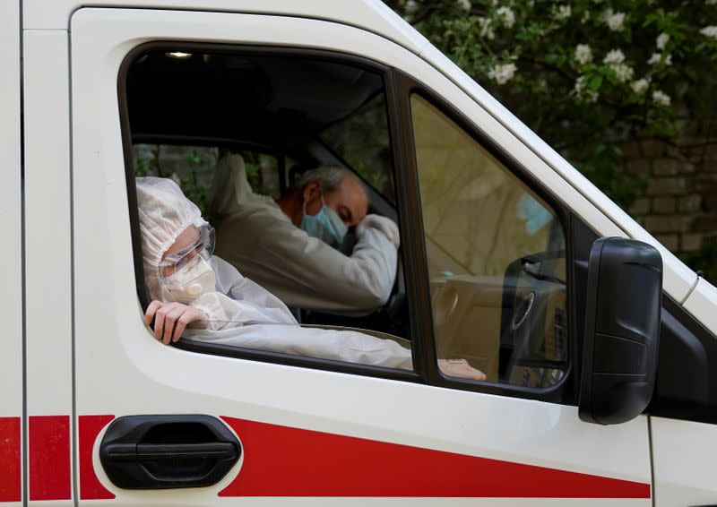 FILE PHOTO: Paramedics carry out their duties amid the coronavirus disease outbreak in Tver