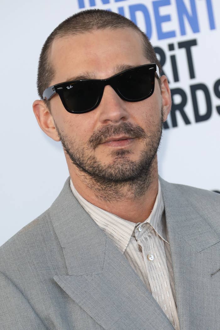 A closeup of Shia wearing sunglasses