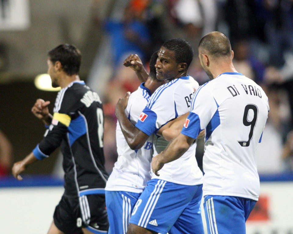 MONTREAL, CANADA - AUGUST 18: Patrice Bernier #8 of the Montreal Impact celebrates his penalty kick goal with teammates during the match against the San Jose Earthquakes at the Saputo Stadium on August 18, 2012 in Montreal, Quebec, Canada. The Impact defeated the Earthquakes 3-1. (Photo by Richard Wolowicz/Getty Images)