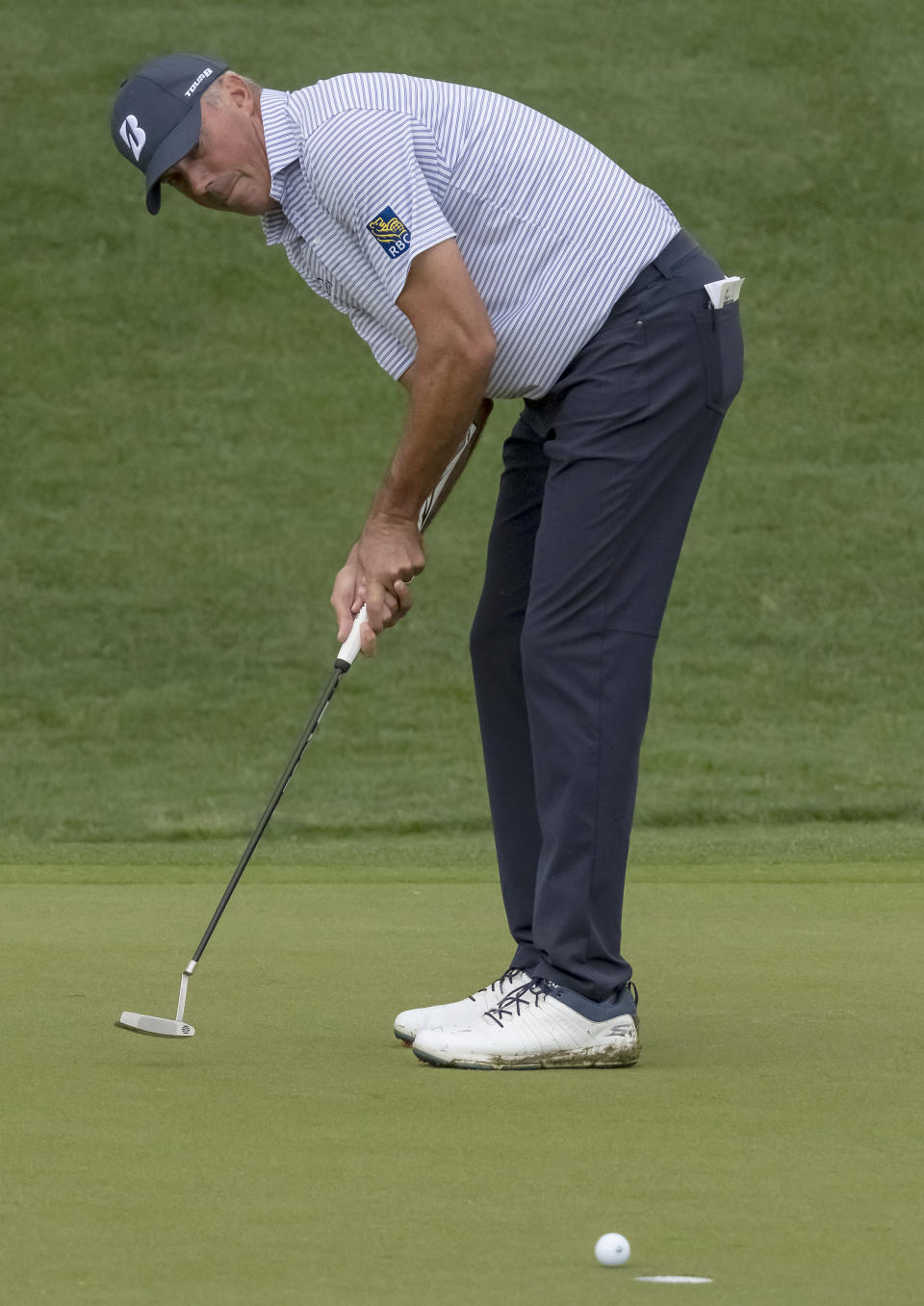 Matt Kuchar watches his putt for birdie on the fifth tenth green go in the cup during the first round of the Valero Texas Open golf tournament, Thursday, March 30, 2023, in San Antonio. (AP Photo/Rodolfo Gonzalez )