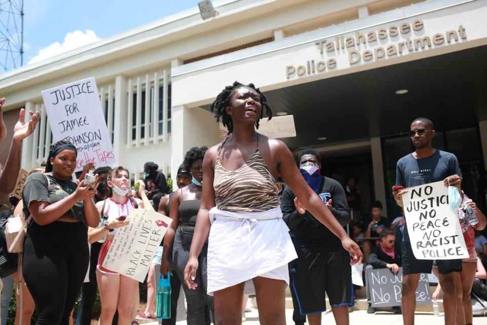 Oluwatoyin Salau, 19, protests in front of the Tallahassee Police Department on May 30. Salau went missing June 6 and was found dead June 13.