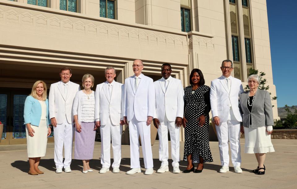 A photo taken prior to the dedication of the Saratoga Springs Utah Temple includes, from left to right, Bishop L. Todd Budge, second counselor in the Presiding Bishopric, and his wife, Sister Lori Budge; Elder Kevin R. Duncan, General Authority Seventy and executive director of the Temple Department, and his wife, Sister Nancy Duncan; President Henry B. Eyring, second counselor in the First Presidency; Elder Adeyinka A. Ojediran, General Authority Seventy, and his wife, Sister Olufunmilayo Ojediran; and Elder Hugo E. Martinez, General Authority Seventy and first counselor in the Utah Area presidency, and his wife, Sister Nunia Martinez; in Saratoga Springs, Utah, on Sunday, Aug. 13, 2023. | Scott G Winterton, Deseret News