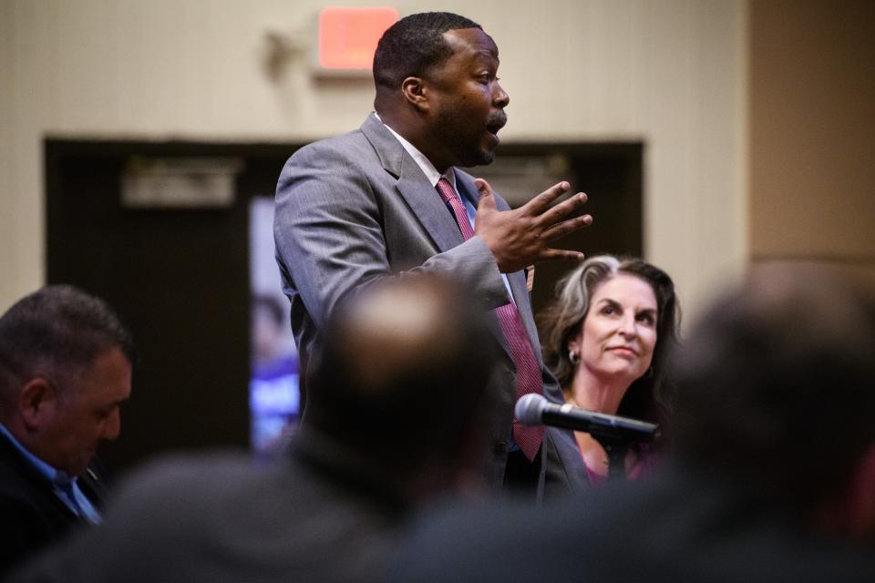 City Council District 1 candidate William Milbourne III speaks at the Fayetteville Observer candidate forum at Fayetteville Technical Community College on Tuesday, April 26, 2022. Also pictured, Alex Rodriguez, left, and Kathy Keefe Jensen.