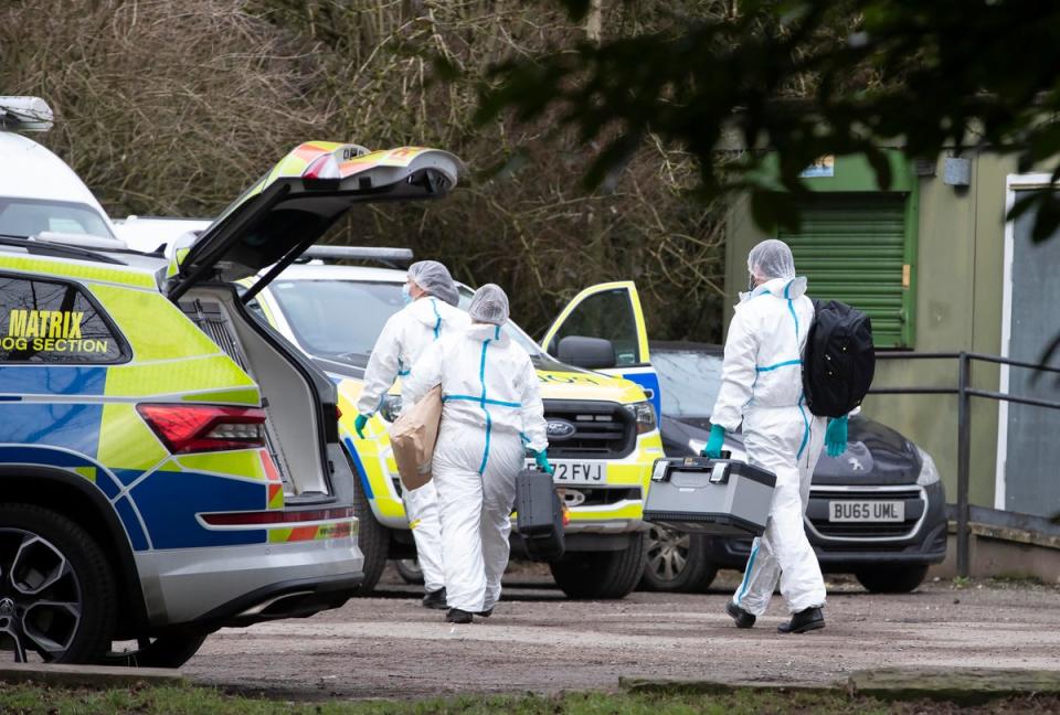 Police forensics officers at the scene in Culcheth Linear Park in Warrington, Cheshire, following the murder of Brianna Ghey (PA)