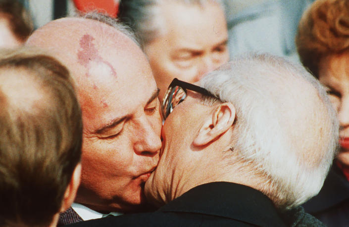 FILE - Soviet leader Mikhail Gorbachev, center left, kisses East Germany leader Erich Honecker during their meeting in Berlin, East Germany, Friday, Oct. 6, 1989. Russian news agencies are reporting that former Soviet President Mikhail Gorbachev has died at 91. The Tass, RIA Novosti and Interfax news agencies cited the Central Clinical Hospital. (AP Photo/Boris Yurchenko, File)