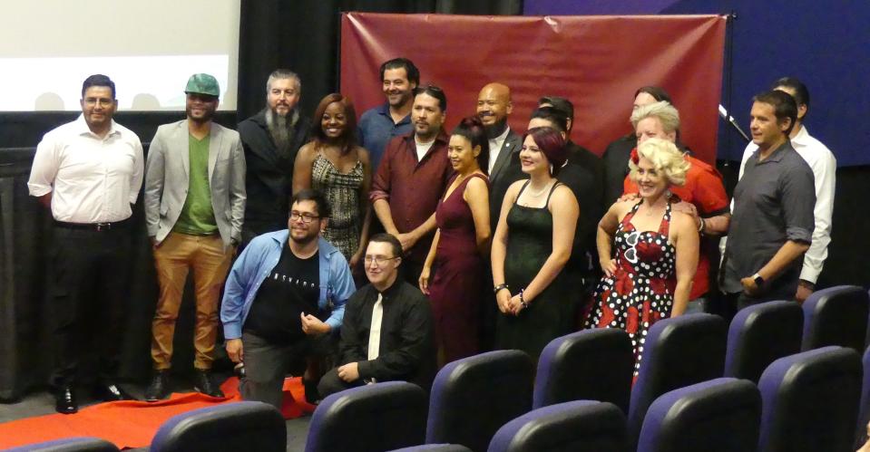 Some of the cast and crew of the sci-fi film UNSHADOW: Hiding Place after the red-carpet screening of the picture Sunday at the AMC theater in Apple Valley.