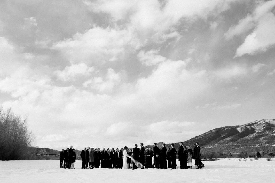 For us, this image captured everything. You wouldn’t think this was a photo of a wedding party gathered in a field if not for the veil blowing in the wind. I love that subtlety. Our intention in getting married in Aspen was to be in the mountains and to nod to Peter’s family’s history there. And we wanted our closest friends to be there with us. Our original venue was 14 miles up a valley just outside of town. So it was important to us that we get married in a spot that would bring us close to the feel of that setting—removed, quiet, and beautiful.