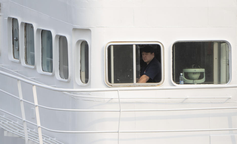 Crew on the bridge of the Polar Prince prepare to dock the ship as it arrives at the Coast Guard wharf, Saturday, June 24, 2023 in St. John's, Newfoundland. Authorities from the U.S. and Canada began the process of investigating the cause of the fatal Titan submersible implosion even as they grappled with questions of who was responsible for determining how the tragedy unfolded. (Adrian Wyld /The Canadian Press via AP)