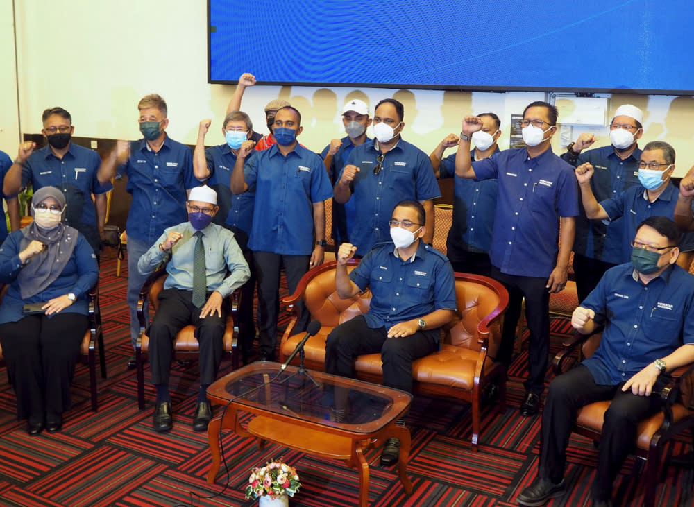 Mohd Rafiq (seated, second from right) will submit his formal resignation letter to Bersatu president and PN chairman Tan Sri Muhyiddin Yassin tomorrow. — Bernama pic