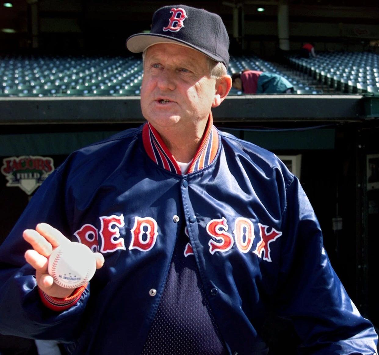 ORG XMIT: FILE--Boston Red Sox manager Jimy Williams holds court in the dugout before the Red Sox take batting practice, Oct. 7, 1999 at Jacobs Field in Cleveland. Two straight 90-win seasons. The Manager of the Year award. None of that has changed the folksy skipper of the Boston Red Sox, who is much sharper than his ``aw shucks'' manner would have you believe. (AP Photo/Tony Dejak)