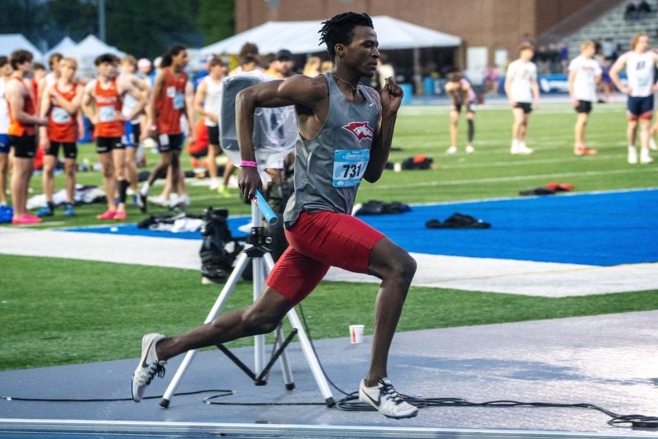 DCG's John Kitenge runs the 4x400 meter relay during the Drake Relays at Drake Stadium on Saturday, April 27, 2024, in Des Moines.