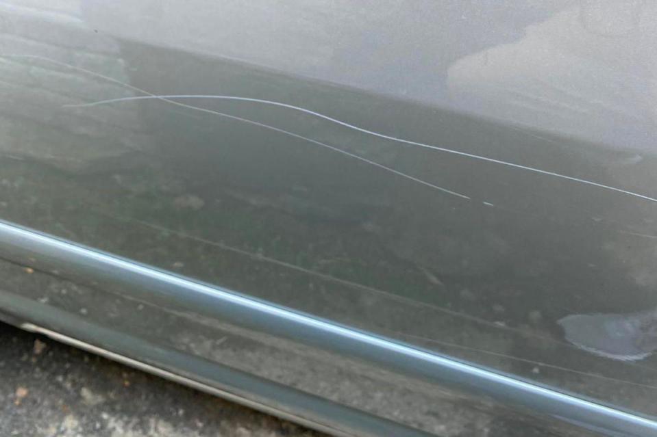 Scrapes on the side of silver-coloured car belonging to a resident of De Burgh Terrace