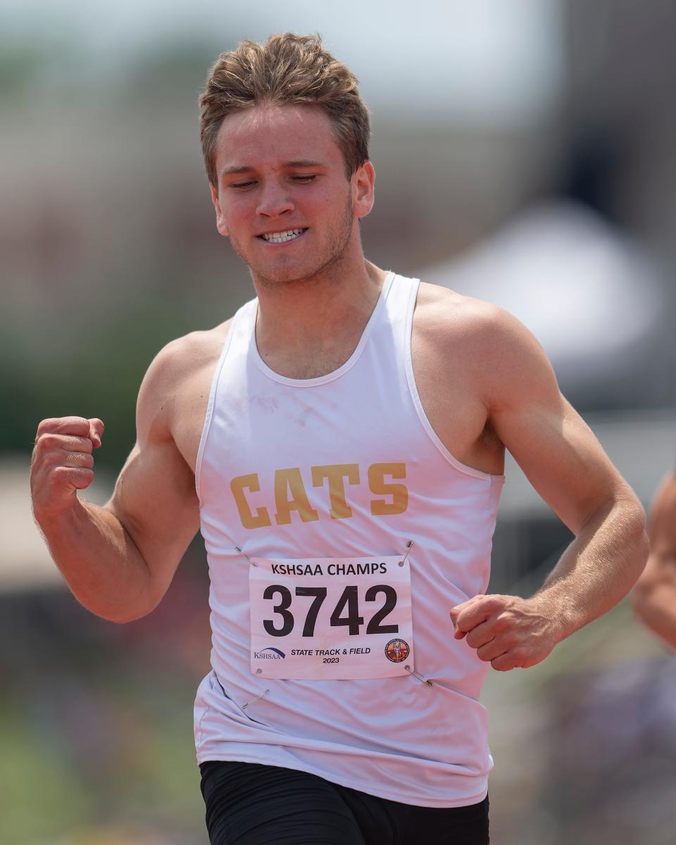 Hayden Finn Dunshee reacts after competing in the 100 meter dash on Saturday May. 27, 2023, during state track at Cessna Stadium in Wichita, Kan.