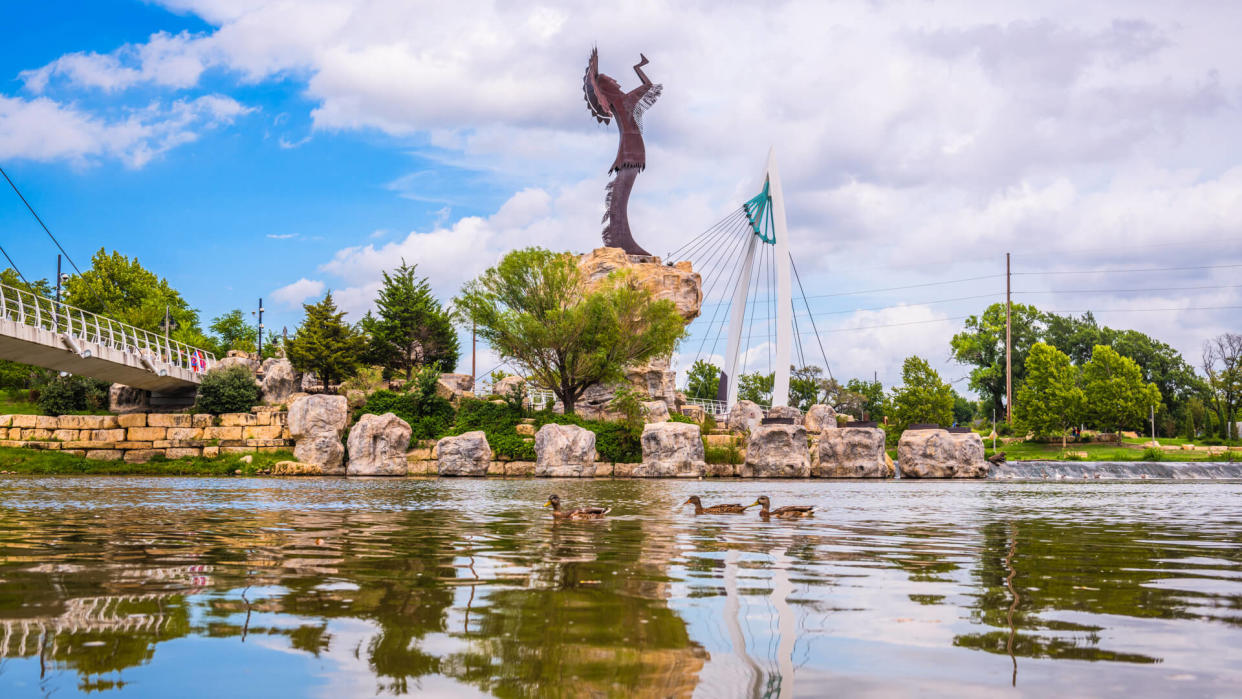 WICHITA, KANSAS - AUGUS 30, 2018: The confluence of the Arkansas and Little Arkansas River at the Keeper of the Plains near downtown Wichita.