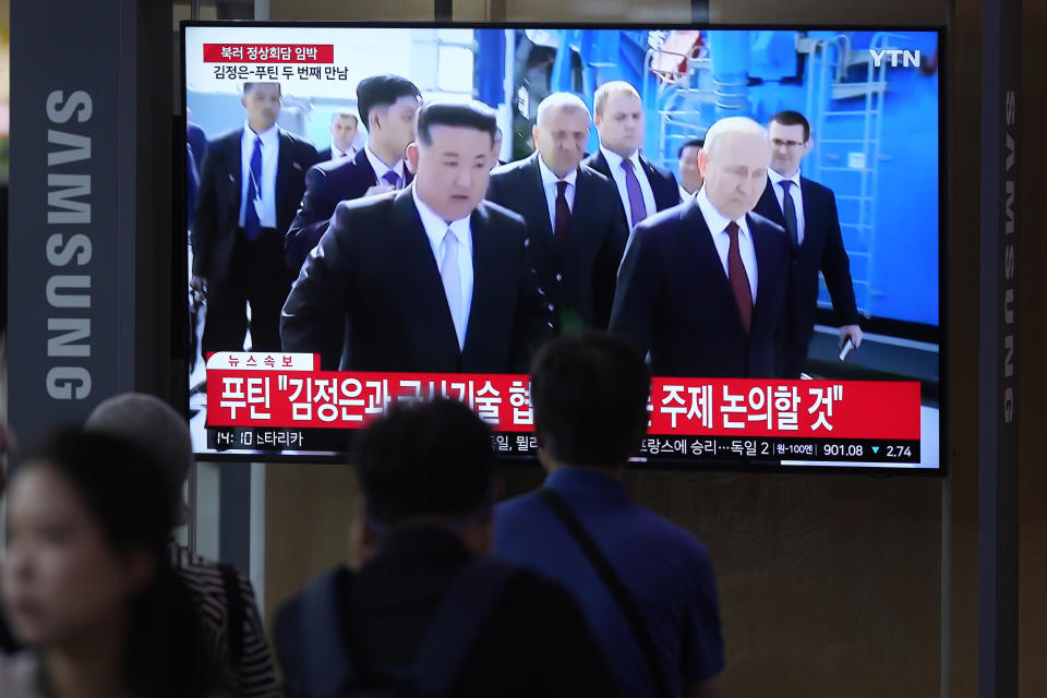 A TV screen shows a report of a meeting between Russian President Vladimir Putin and North Korea's leader Kim Jong Un, during a news program at the Seoul Railway Station in Seoul, South Korea, Wednesday, Sept. 13, 2023. The leaders of Russia and North Korea met at a remote Siberian rocket launch facility for a summit that underscores how the two leaders' interests are aligning in the face of their separate, intensifying confrontations with the United States. (AP Photo/Lee Jin-man)