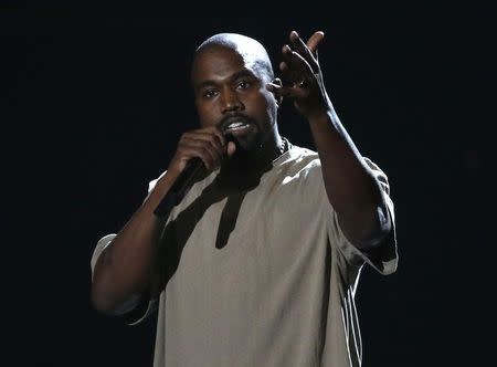 Kanye West accepts the Video Vanguard Award at the 2015 MTV Video Music Awards in Los Angeles, California, August 30, 2015. REUTERS/Mario Anzuoni