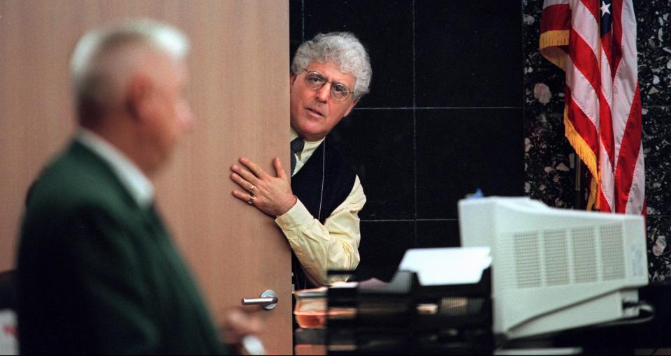 WEST PALM BEACH;1/4/99:  Judge Harold J. Cohen, sticks his head into the courtroom in this January 01, 1999 photo, while jurors filled out questionnaires during jury selection in the Duane Owen murder trial.  Cohen left the courtroom after initially talking to prospective jurors and passing out questionnaires to be filled out.  Jurors were then released to be questioned in detail later this week.  