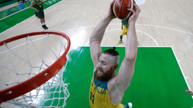 Aaron Baynes throws down a dunk against Lithuania.