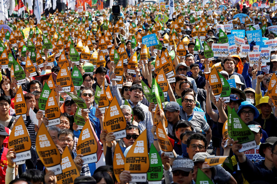 Union workers chant slogans