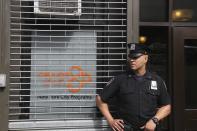 <p>NEW YORK, NY – JUNE 21: New York City police officers (NYPD) stand guard outside of Cayuga Center, a immigrant foster care facility, in East Harlem where immigrant children who have been separated from their parents are taken during the day as a result of President Donald Trump’s Zero Tolerance illegal immigration policy in New York City on June 21, 2018. (Photo: Rainmaker Photo/MediaPunch/IPX/AP) </p>