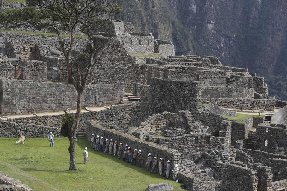 The Machu Picchu archeological site is devoid of tourists while it’s closed amid the COVID-19 pandemic, in the department of Cusco, Peru, Tuesday, Oct. 27, 2020. Currently open to maintenance workers only, the world-renown Incan citadel of Machu Picchu will reopen to the public on Nov. 1. (AP Photo/Martin Mejia)