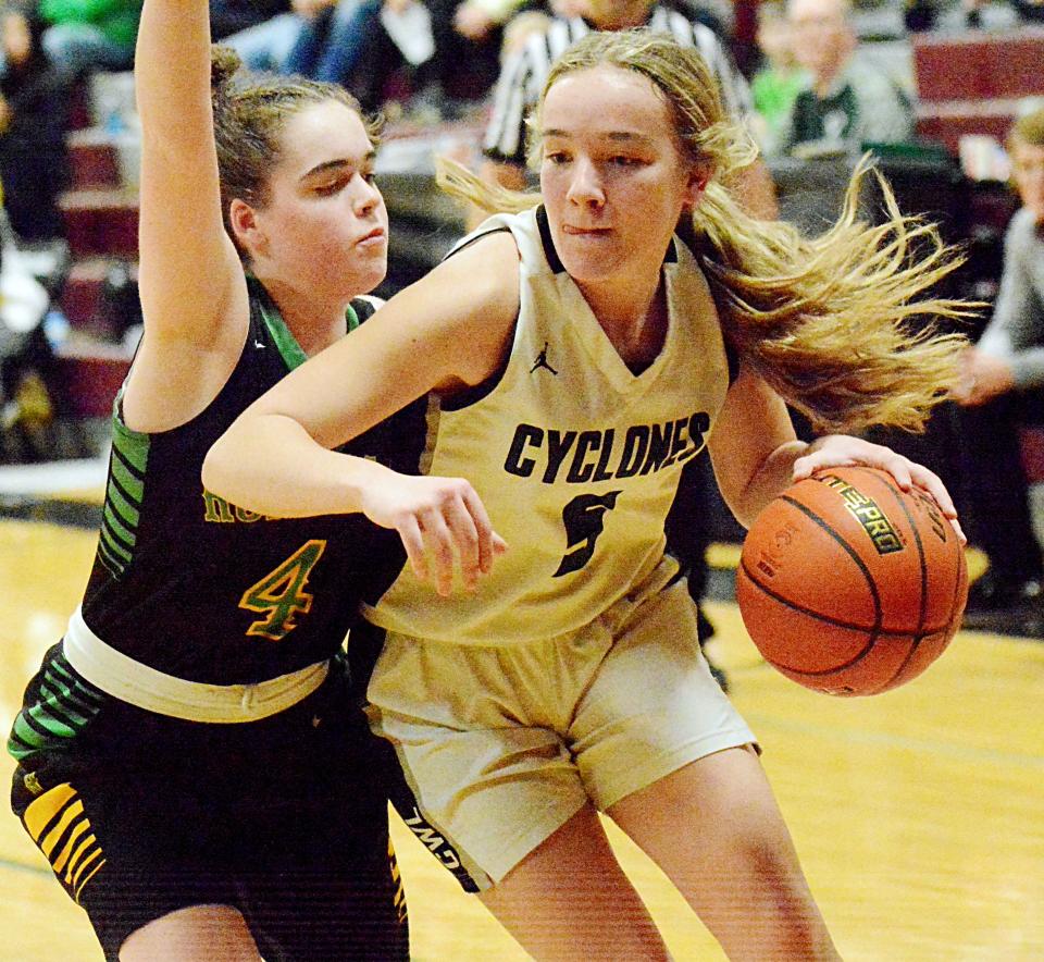 Clark-Willow Lake's Tehya Vig (5) drives against Aberdeen Roncalli's Maddie Huber during their Northeast Conference high school basketball doubleheader on Thursday, Jan. 19, 2023 in Clark.