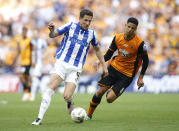 Britain Soccer Football - Hull City v Sheffield Wednesday - Sky Bet Football League Championship Play-Off Final - Wembley Stadium - 28/5/16 Sheffield Wednesday's Sam Hutchinson in action with Hull City's Curtis Davies Action Images via Reuters / Andrew Couldridge Livepic EDITORIAL USE ONLY. No use with unauthorized audio, video, data, fixture lists, club/league logos or "live" services. Online in-match use limited to 45 images, no video emulation. No use in betting, games or single club/league/player publications. Please contact your account representative for further details.
