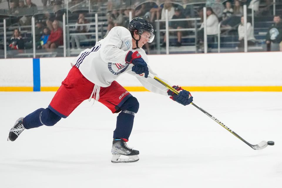 Forward Kent Johnson finished with three assists in nine games for the Blue Jackets last season.