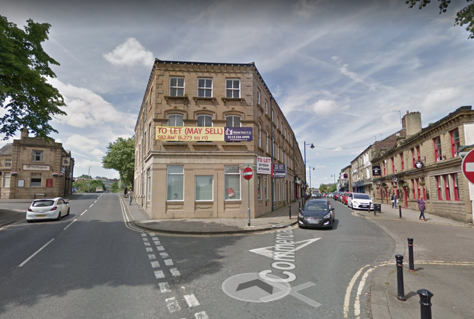 Police raided the empty Yorkshire Bank building in Batley, West Yorkshire, where a body was reportedly discovered in a wall (Picture: Google Maps)